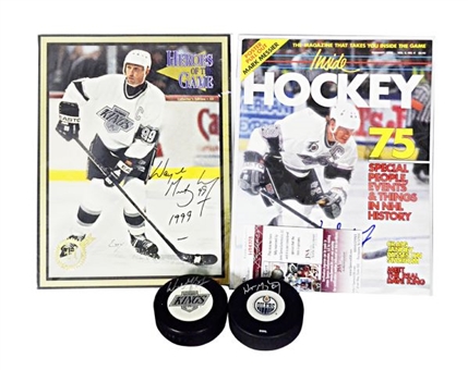 Lot of Four Great one Autos:Wayne Gretzky Signed Pucks (2) and Magazine Covers (2)